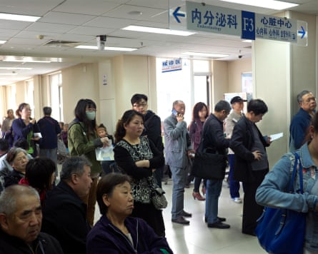 Patients in a crowded hospital in Beijing.