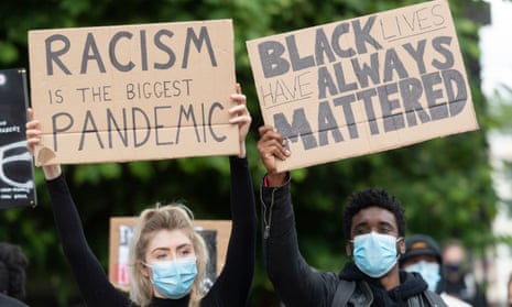  Demonstrators stage a Black Lives Matter protest outside the US Embassy, 7 June.