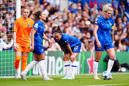 Millie Bright (right) and her Chelsea teammates stand dejected after Barcelona's second goal in their Women's Champions League semi-final, second leg match at Stamford Bridge in April