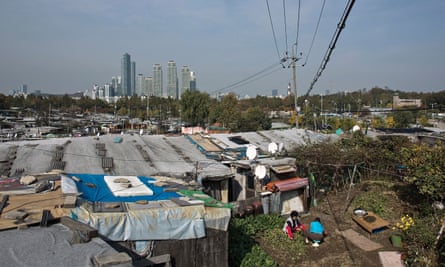 Guryong slum spreads out before the skyscrapers of Gangnam in Seoul