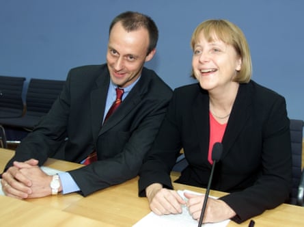 Merz with Angela Merkel in 2001.