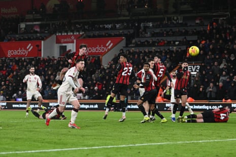 Dominik Szoboszlai (left) thumps the ball past the Bournemouth defenders and into their goal for Liverpool’s equaliser.