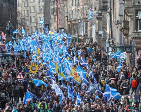 Supporters of Scottish independence wave flags and march in Edinburgh, this year.