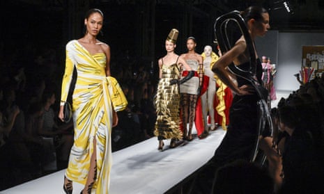Model Joan Smalls in a yellow Moschino gown.
