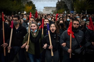 Demonstrators take part in a march towards the US embassy, during a rally marking the 48th anniversary of the 1973 Athens Polytechnic uprising against the military junta.