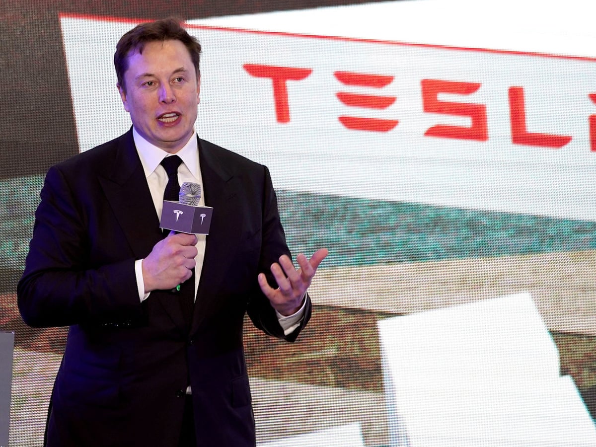 Tesla stock marks lowest close in years as investors worry about Musk's focus | Tesla | The Guardian