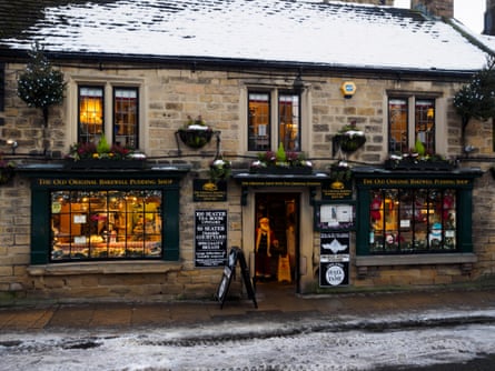 shop front of the Old Original Bakewell Pudding Shop in classic Peak District stone building