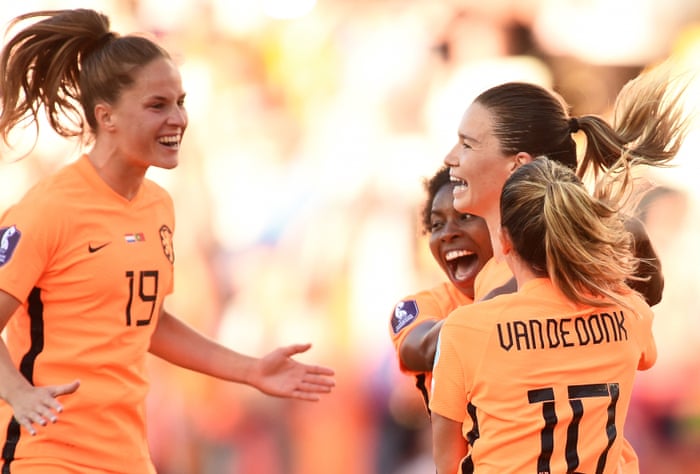 Damaris Egurrola (centre right) celebrates with her Dutch teammates after opening the scoring.