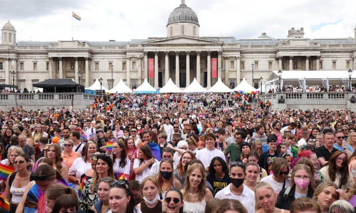 Revellers gather outside the National Gallery in Trafalgar Square.