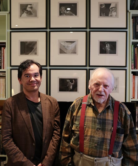 Lucky find … Tony Lee Moral, left, and John Russell Taylor in front of the latter’s framed images.