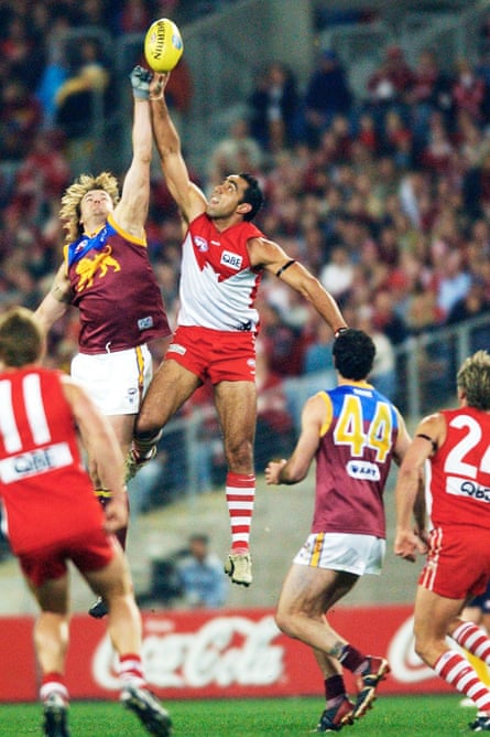 Adam Goodes leaps for the ball in a game against the Brisbane Lions in 2003.