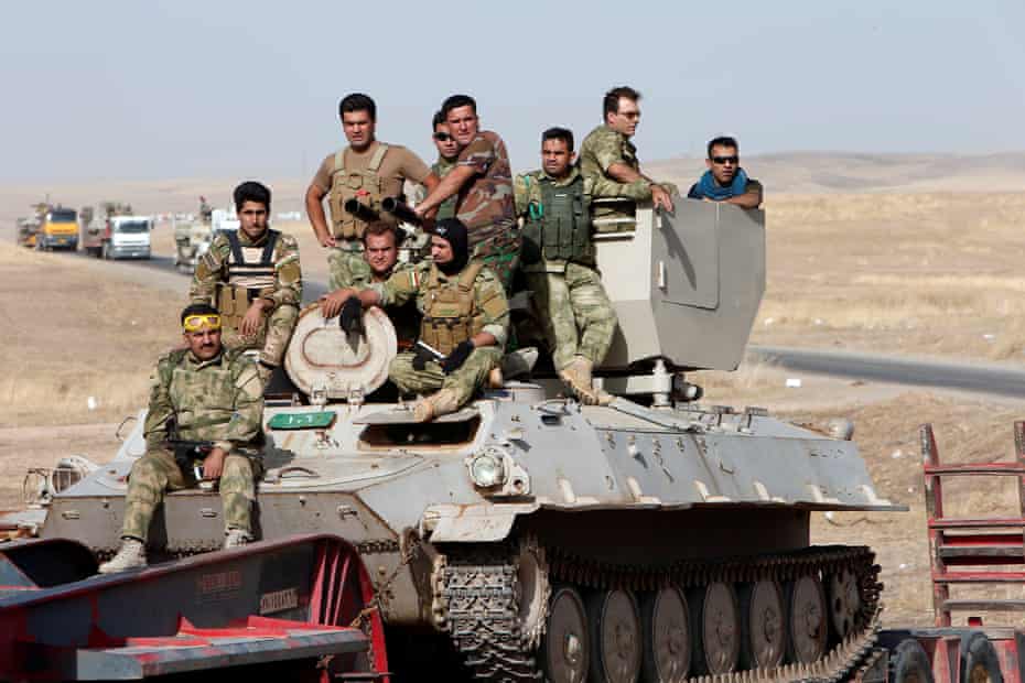 Kurdish Peshmerga forces travelling to Mosul in preparation for the attack 