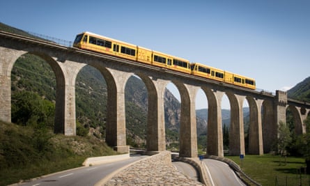 The Petit Train Jaune (little yellow train), crossing the Pont Séjourné viaduct in the French Pyrenees.