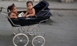 Toddlers in a pram in Havana, Cuba