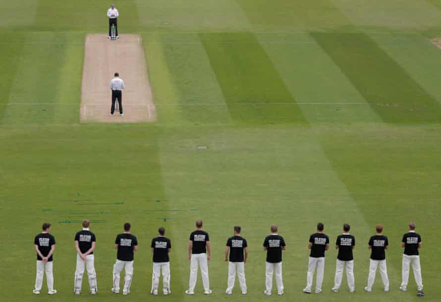 The England players wearing black t-shirts bearing slogans in a moment of unity just before the start of play during day one of the England v New Zealand 2nd test match at Edgbaston Cricket Ground on June 10th 2021.