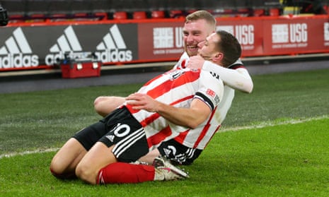 Billy Sharp of Sheffield United celebrates with Oli McBurnie after scoring their second goal.