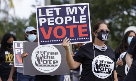 Supporters of felon voting rights with sign 'let my people vote'