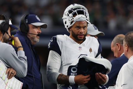 Dak Prescott of the Dallas Cowboys and head coach Mike McCarthy are seen on the sideline during the second quarter of Sunday’s win over the Philadelphia Eagles at AT&T Stadium.