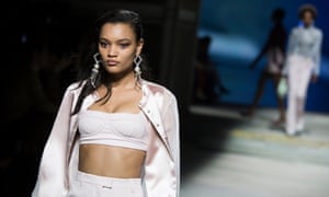 A model presents a creation by Topshop during the London Fashion Week