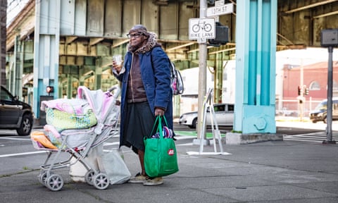 Brenda stands on the junction of 13th and 11th Streets, San Francisco, near the Division Street homeless camp close to Airbnb’s HQAll photographs: David Levene for the Guardian