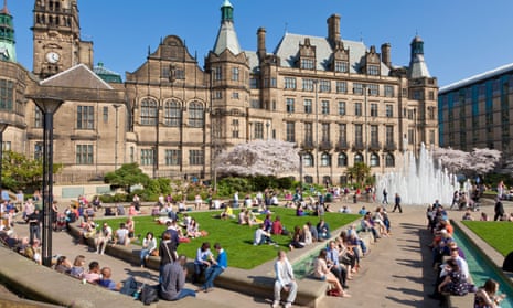 People enjoy sunshine at Sheffield town hall and Peace Gardens.