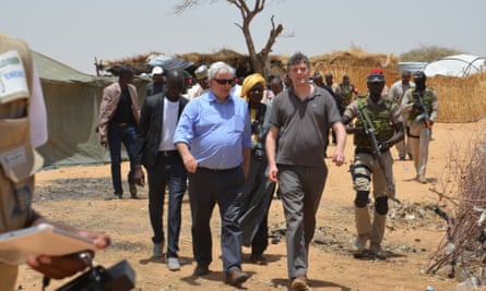 Stephen O’Brien, centre, UN under-secretary-general for humanitarian affairs and emergency relief. visits a refugee camp in the south-east of Niger.
