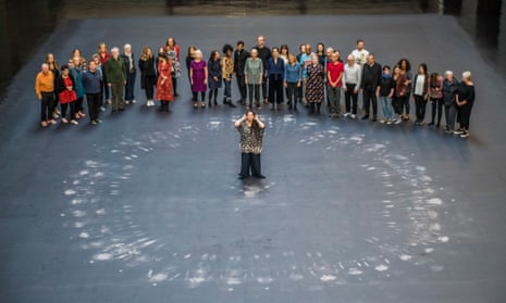 Tania Bruguera stands in the middle of her Turbine Hall commission at Tate Modern