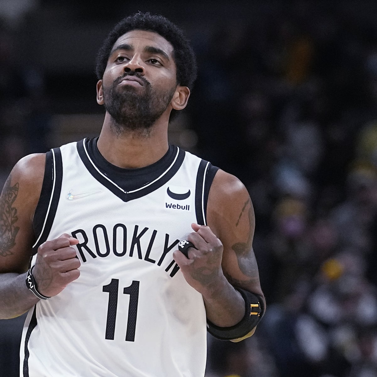 Kyrie Irving's 22 points lift Nets in unvaccinated star's season debut |  Brooklyn Nets | The Guardian