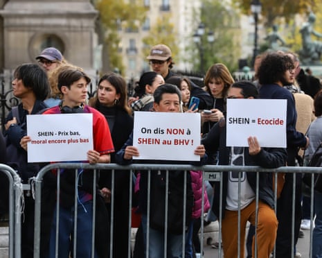 Queue of customers and protesters on the opening day of the Chinese brand Shein store at Bazar de l'Hotel de Ville (Le BHV Marais), in Paris.