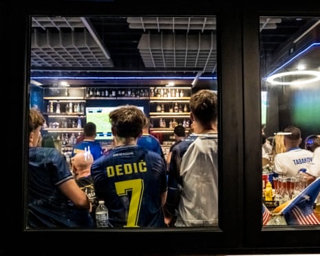 Fans gather for a watch party for the Bosnia and Herzegovina at Bevo Caffe Lounge in St. Louis.