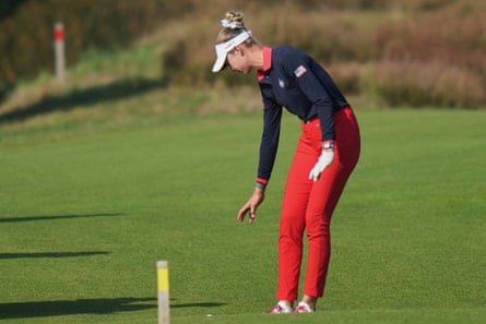 Nelly Korda takes a drop on the 16th hole in the foursomes on day two of the Solheim Cup.