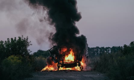A military vehicle on fire in Ukraine’s Sumy region