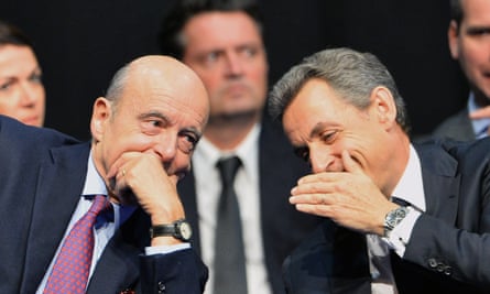 Alain Juppé and Nicolas Sarkozy share a platform in Limoges.