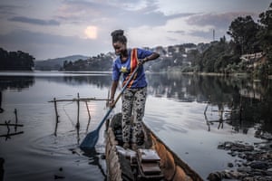Linda Maroy, 20, enjoys a quiet moment on Lake Kivu in the eastern city of Bukavu on the 60th anniversary of DRC’s independence from Belgium on 30 June.