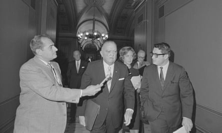 J Edgar Hoover talking with reporters.