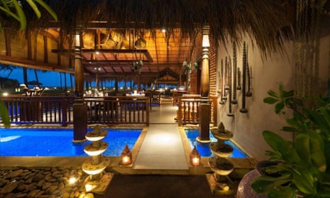 Reef Villa and Spa, Kalutara , Sri Lanka. Pictured here is its terrace and patio area, illuminated at night.