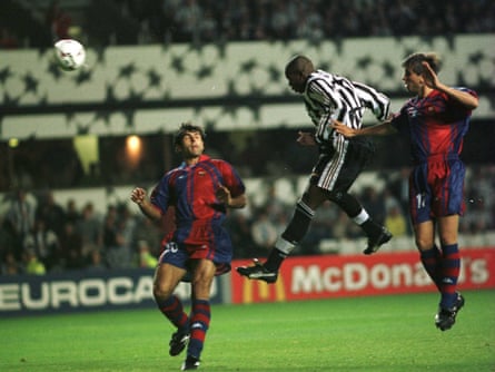 Faustino Asprilla scores for Newcastle against Barcelona.