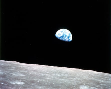 The Earth seen over the surface of the moon, in a photograph taken from Apollo 8, the first crewed mission to the moon
