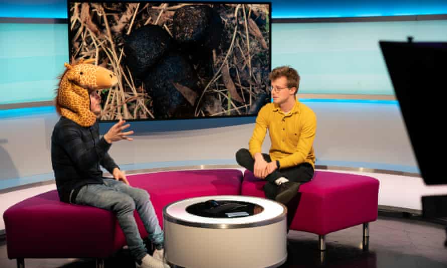 Taking a gentler approach to the news … Martin Dougan (as ‘Jerry’) and Scott Bryan at work on Newsround.