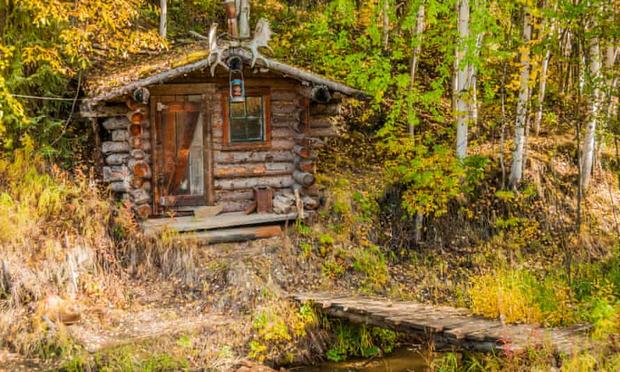 A log cabin in the woods in Alaska