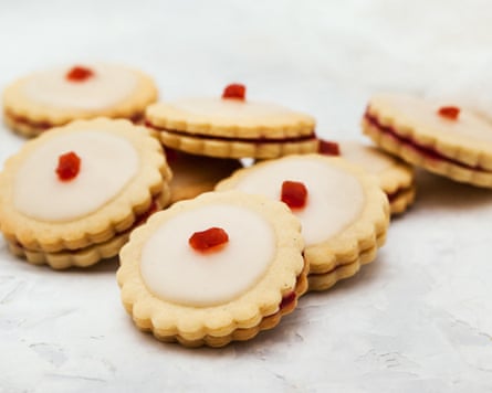 A collection of iced shortbread sandwiched biscuits A collection of iced shortbread sandwiched biscuits