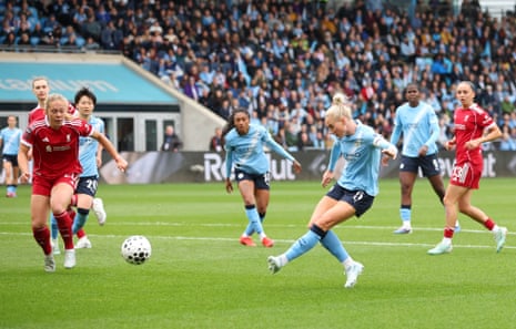Alex Greenwood shoots at goal