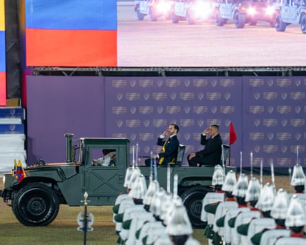 Abelardo de la Espriella (C) salutes during the military recognition ceremony as part of the presidential inauguration day in Cali, Colombia