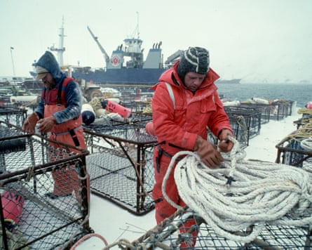Fishers preparing crab pots.
