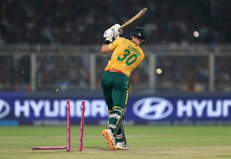 Tristan Stubbs is cleaned out by Lockie Ferguson.