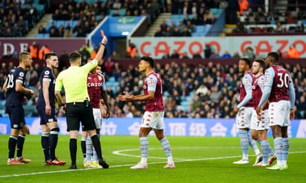 Aston Villa’s Ezri Konsa is shown a red card after an extended look from VAR.