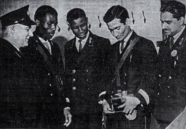 Four newly hired people of colour – (from second left) Norris Edwards, Norman Samuels, Abbas Ali and Mohammed Rashid – are trained by Frank Mills, a ticket inspector, after the abolition of Bristol Omnibus Company’s colour bar.