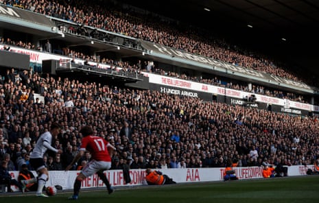 The crowd bathed in sunlight watch near the end of the game against Manchester United in April 2016.