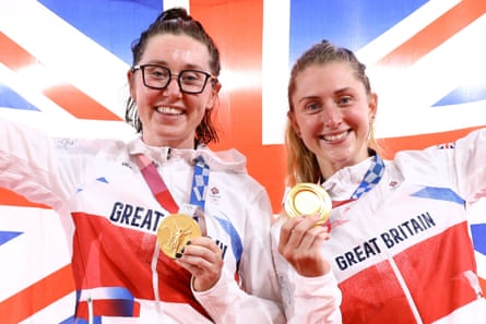 Laura Kenny celebrates winning the first women’s gold medal in the madison relay along with Katie Archibald at the Tokyo Olympics in 2021