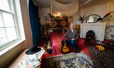 Kathy Etchingham, the former girlfriend of Jimi Hendrix, posing for photographs in his former bedroom, now a museum.
